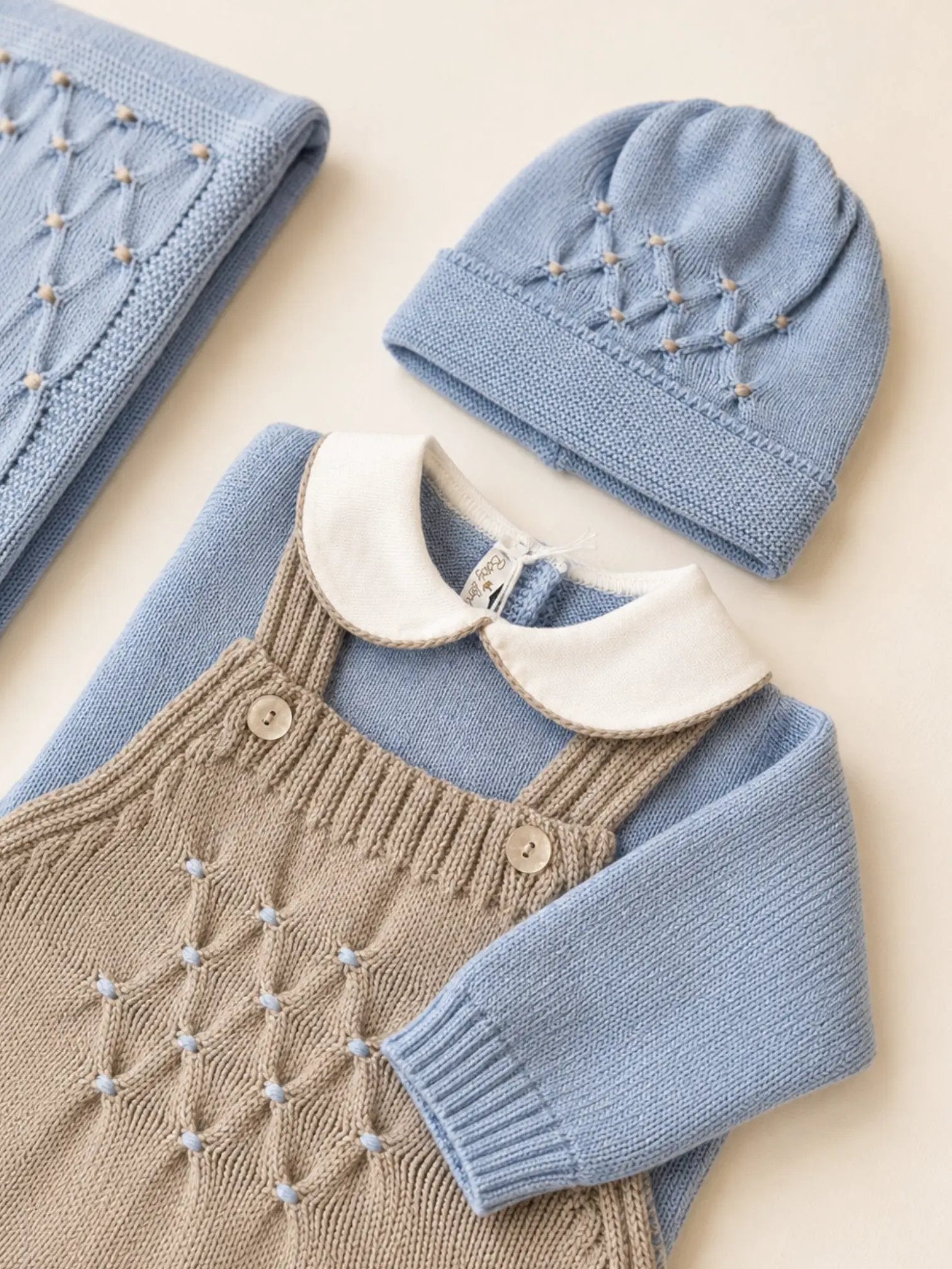 Cuffia Neonato Azzurro NIDO D'APE 600/5848 by BABY LORD