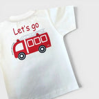 Nanù white cotton t-shirt for boys with a red fire truck graphic and "Let's go" text.